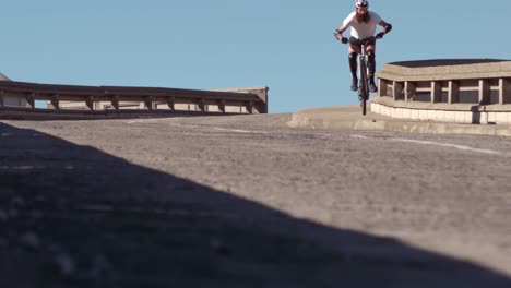 active man riding dirt bike