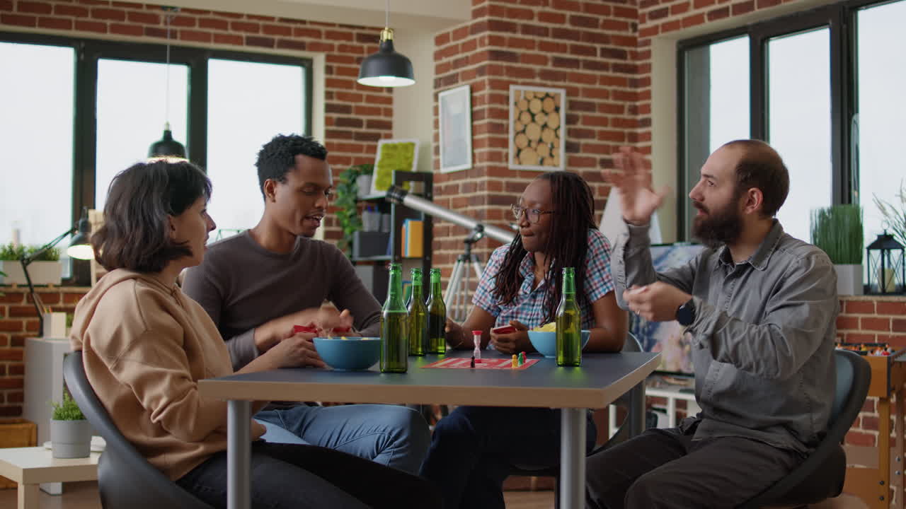 Young people playing strategic board games with cards