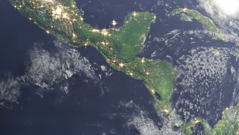 planet earth view from the space of central america with clouds formation weather hurricane and capital city light pollution in 3d rendering animation