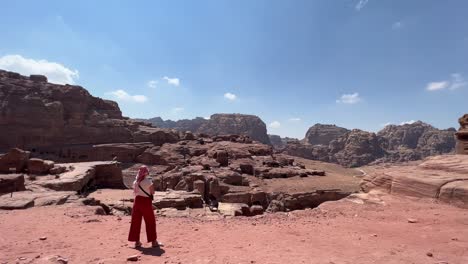 Tall-Women-walking-in-Petra-in-Wadi-Musa,-close-to-the-Treasury-of-Jordan-with-no-other-people-around-4K