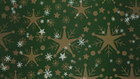 animación de estrellas de navidad cayendo sobre copos de nieve sobre fondo verde