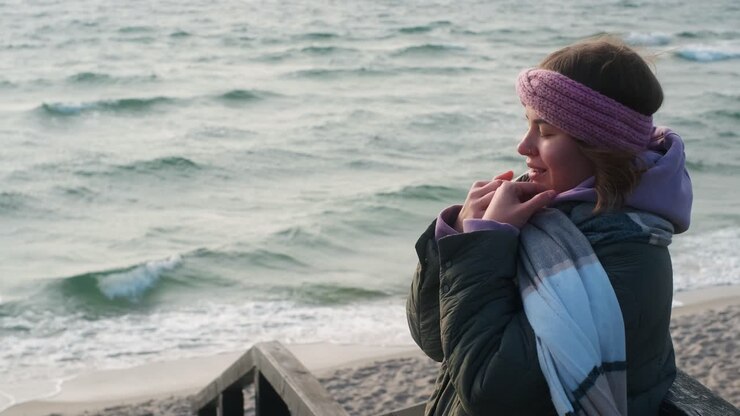 Girl on a beach in winter