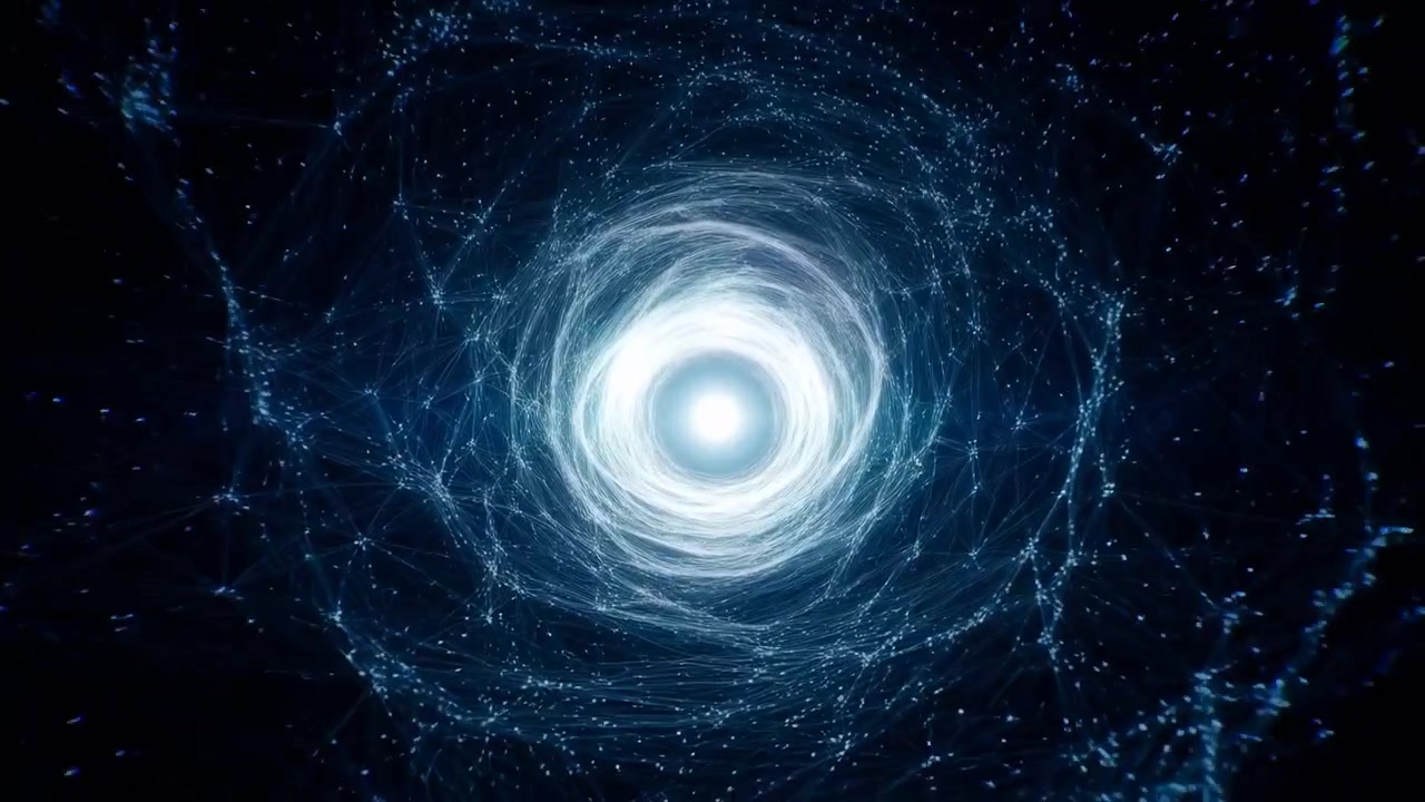 Fine blue light trails and tiny particles spiral around an intense white core, with layered curved strands shifting across a dark field while the central glow gradually grows brighter.