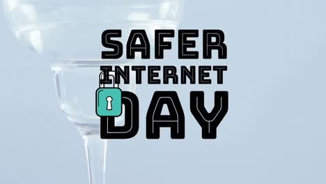 animation of safety internet day over glass of martini on white background