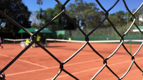 tennis court behind the metal fences. sport metal fence