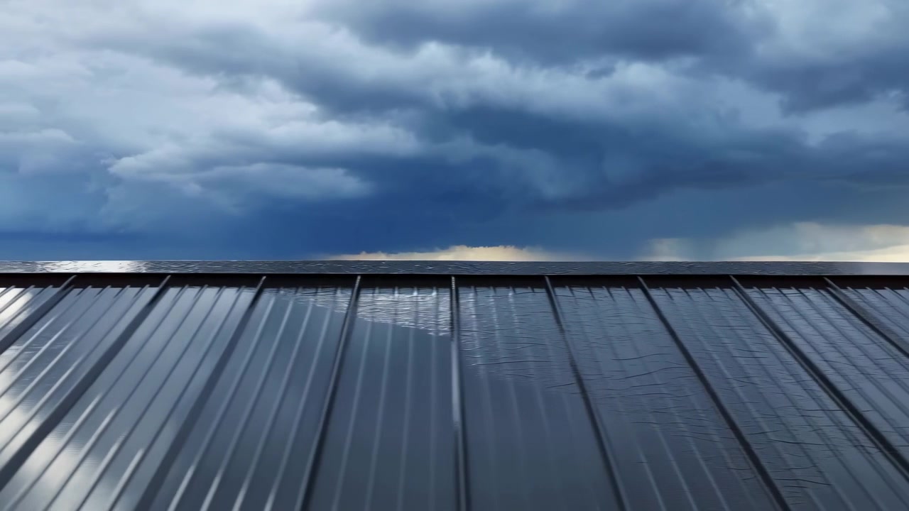 Cloudy sky no action present, in outdoor daytime, with metal roof, with metal texture, from a top-down perspective perspective, with blue, gray accents, and serene and calm mood, clear detail.