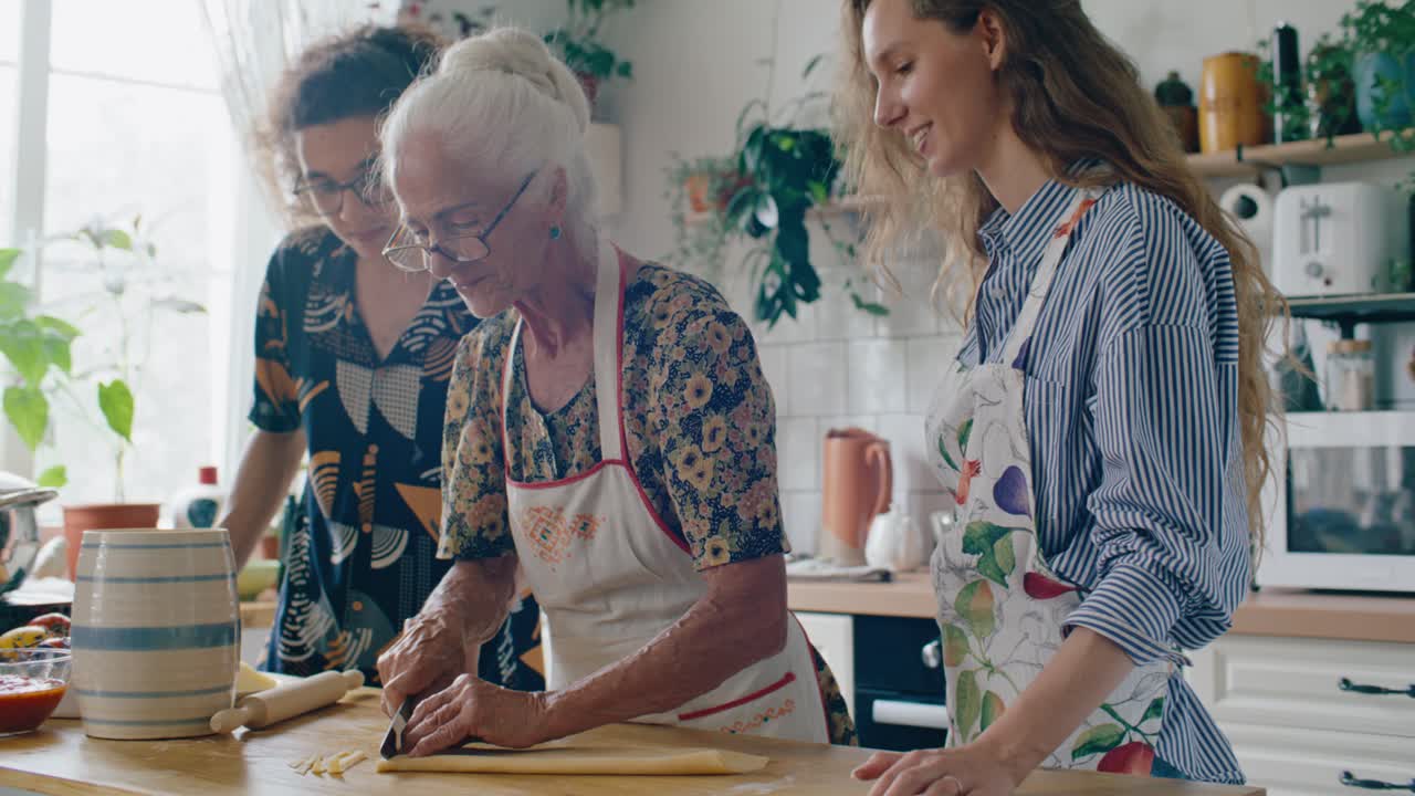 Grandmother Preparing Homemade Pasta with Family in Cozy Kitchen
