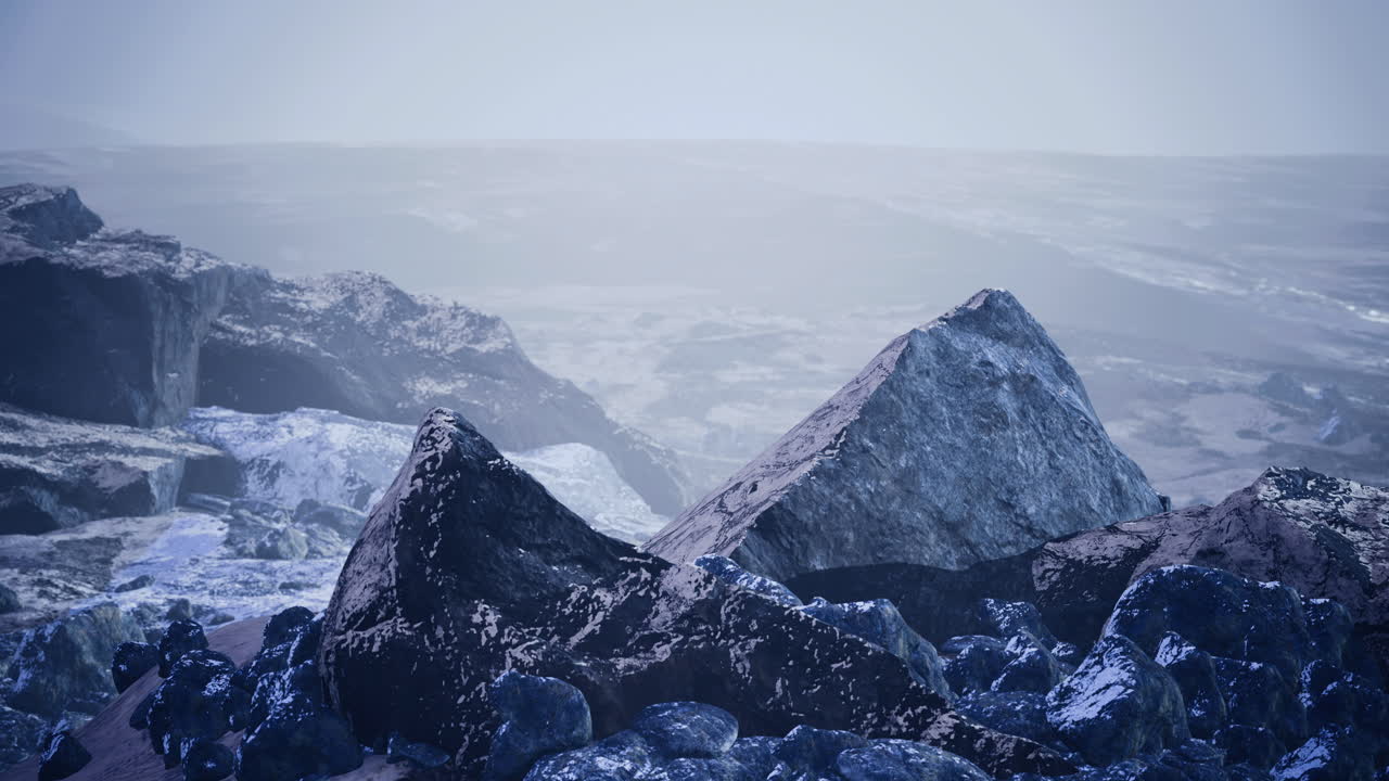 Mysterious rocky landscape with fog and shadows in an otherworldly setting