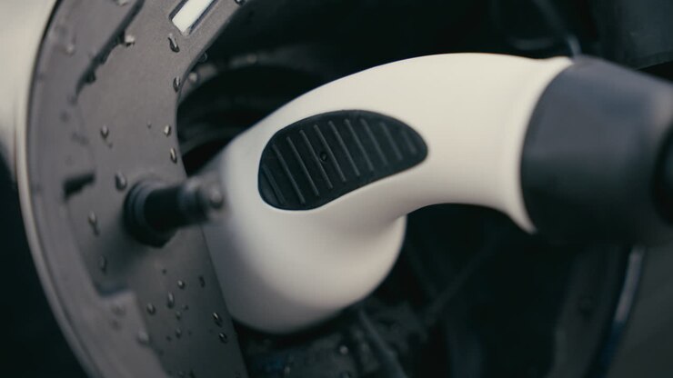Close-up of EV charging process