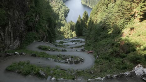 Aerial-Tilting-Shot-of-Kossdalssvingene-in-Osterøy,-Norway