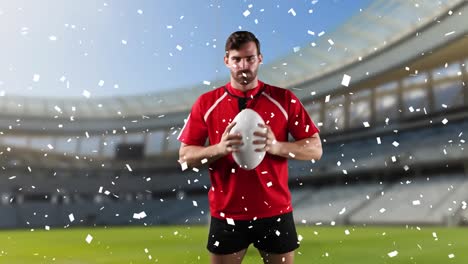 Professional-rugby-player-standing-in-front-of-a-stadium-with-confetti-falling