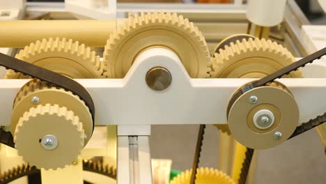 close-up of gears and belts in a machine