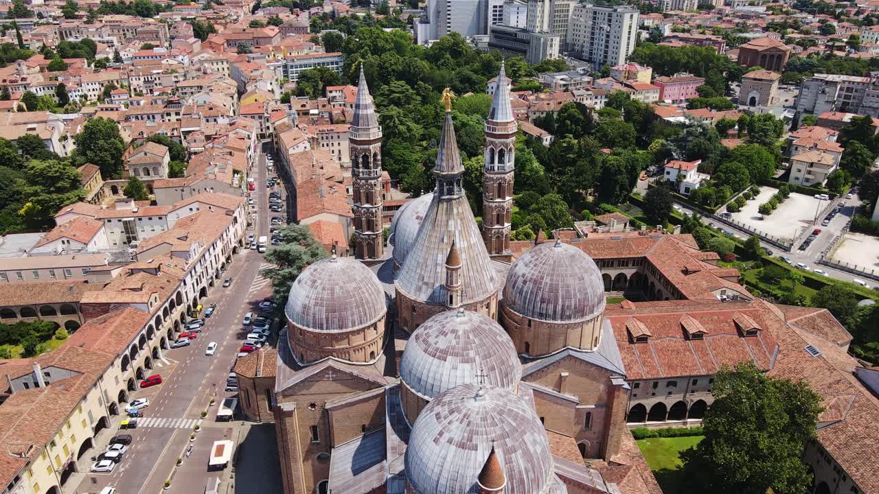 Iconic religious complex in Padua with domes and towers seen from dramatic angle