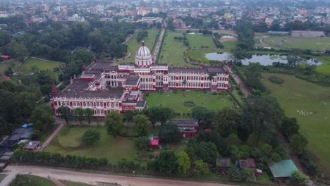 historical monument cooch behar palace and museum on the bank of river torsa in cooch behar city, west bengal, drone shot