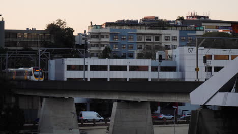 train crosses bridge across the brisbane river