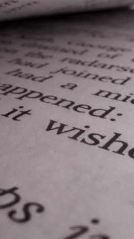 Open book with story text on page in light studio macro view. Learning information and modern literature. Read different books to study and have rest