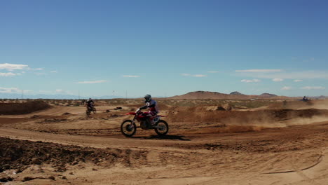 desert bike rider in slow motion in mojave desert