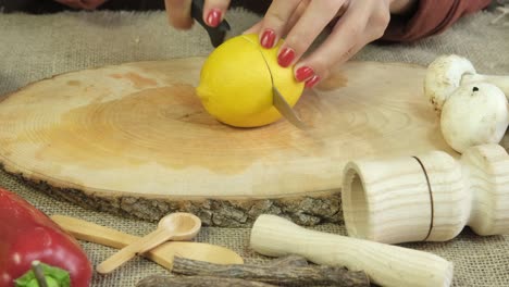 slicing lemon with knife