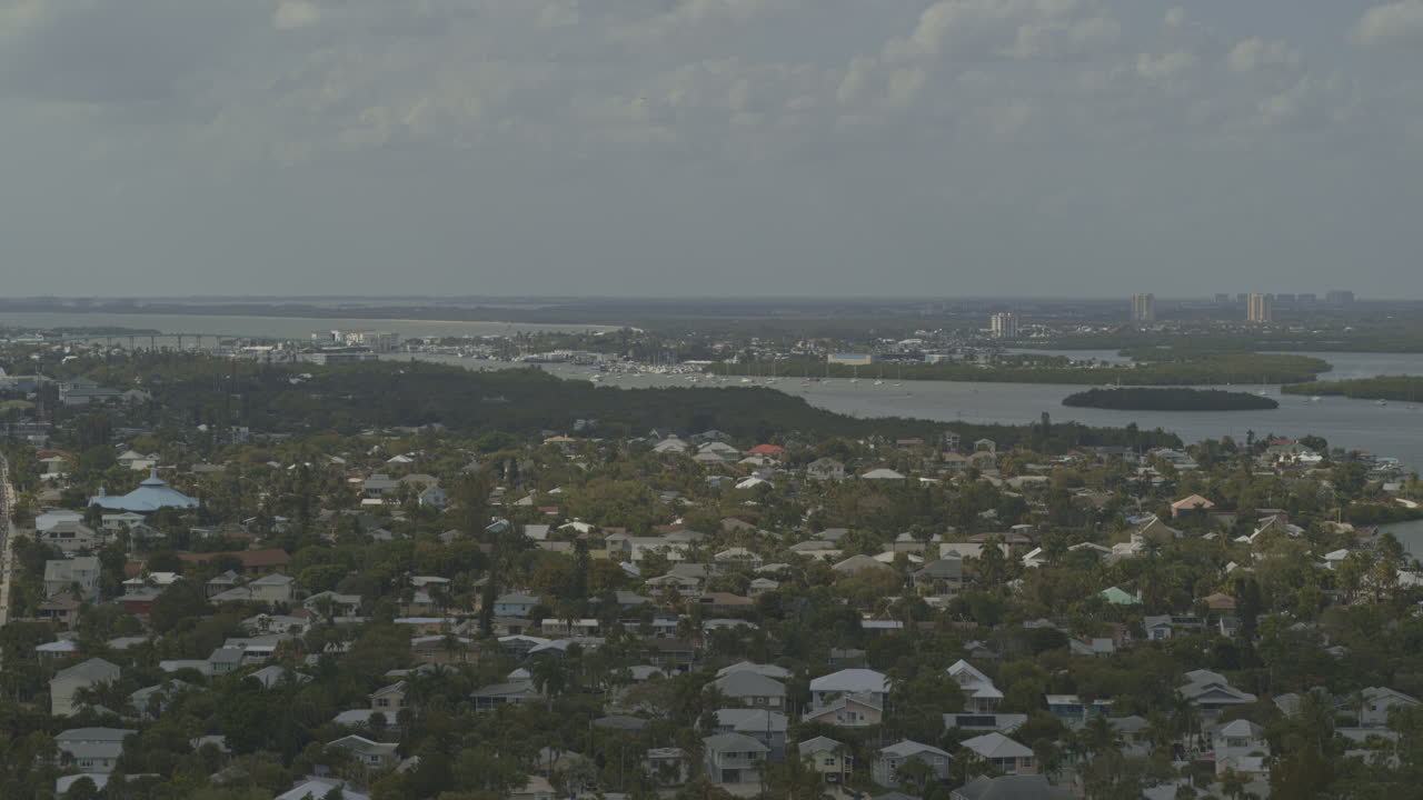 Fort Myers Beach Florida Aerial v2 tracking shot from the harbour neighborhood to the shoreline - DJI Inspire 2, X7, 6k - March 2020
