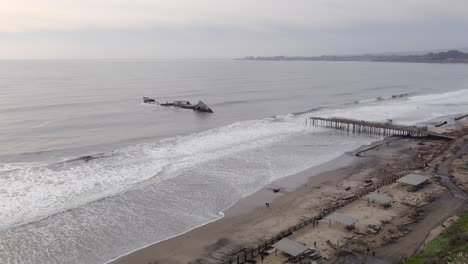 seacliff pier tourist destination destroyed in a storm in california in january 2023 aerial orbiting view