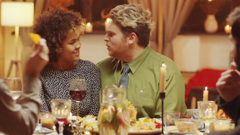 happy couple at festive dinner