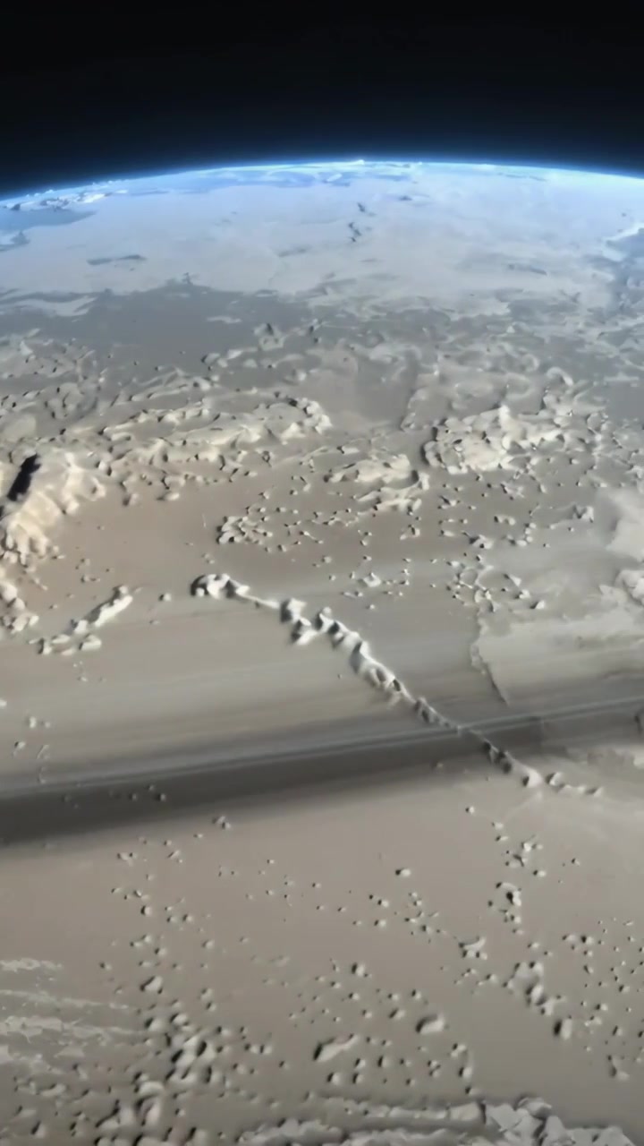 Vertical video: Orbiting camera panning over cratered plains after orbit entry, showing ring shadow