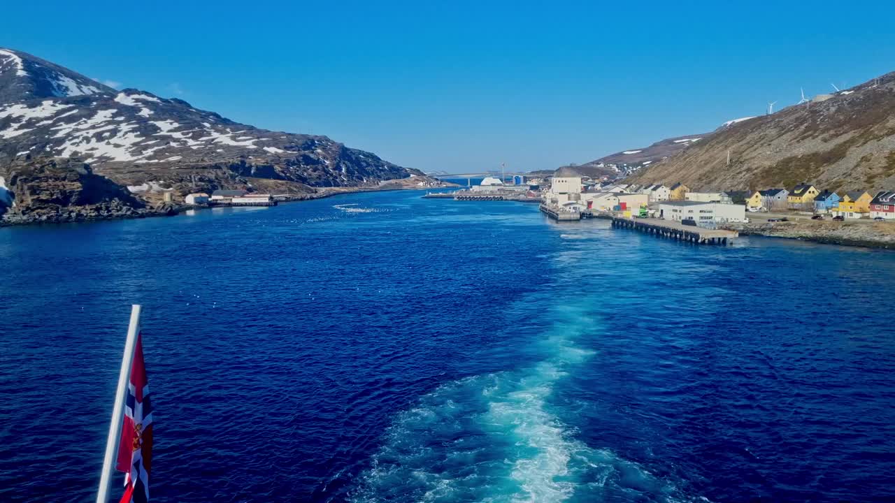 The view from the deck of a cruise ship sailing along the coast of Norway