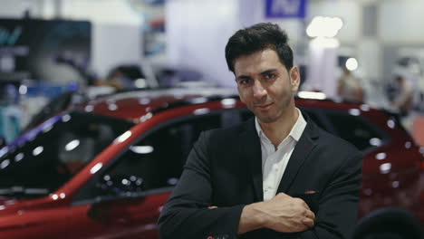 businessman at a car show