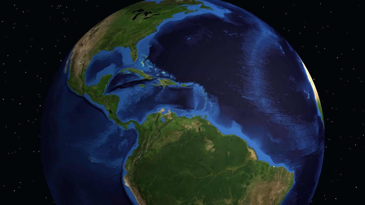 Il globo digitale ruota e ingrandisce l'America Centrale, evidenziando Huehuetenango con un segnaposto