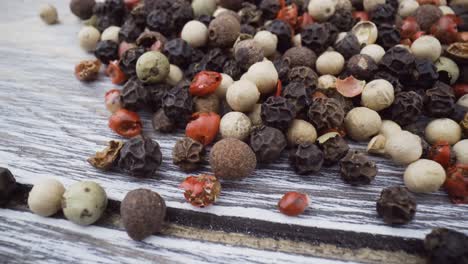 Macro-close-up-Mixed-peppercorns.-Dry-mix-peppercorns-close-up