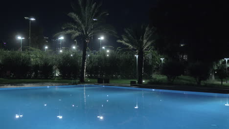 night view of swimming pool on resort