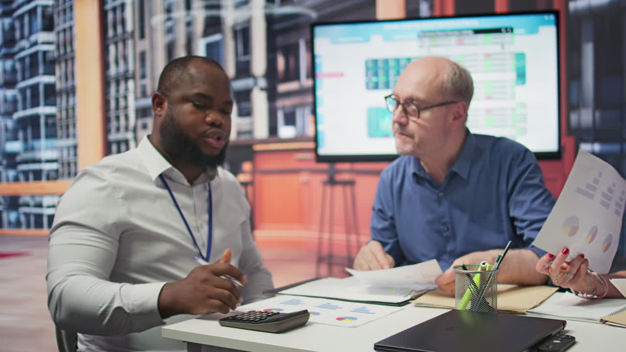 Mature couple in a consultation with financial advisor about retirement planning