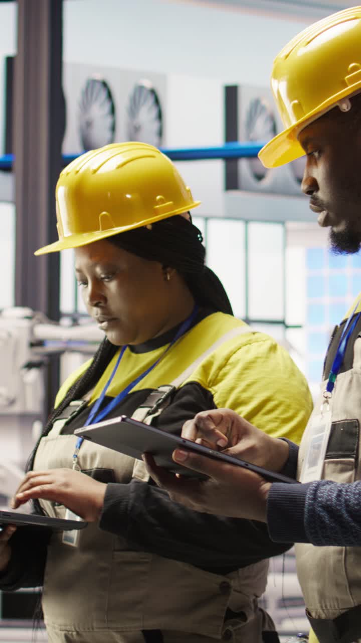 Vertical video Smart factory engineering team implement automated workflows