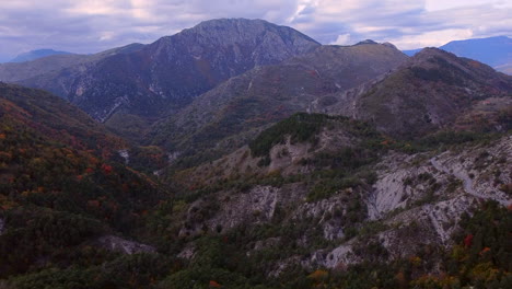 aerial view of mountains and colorful trees