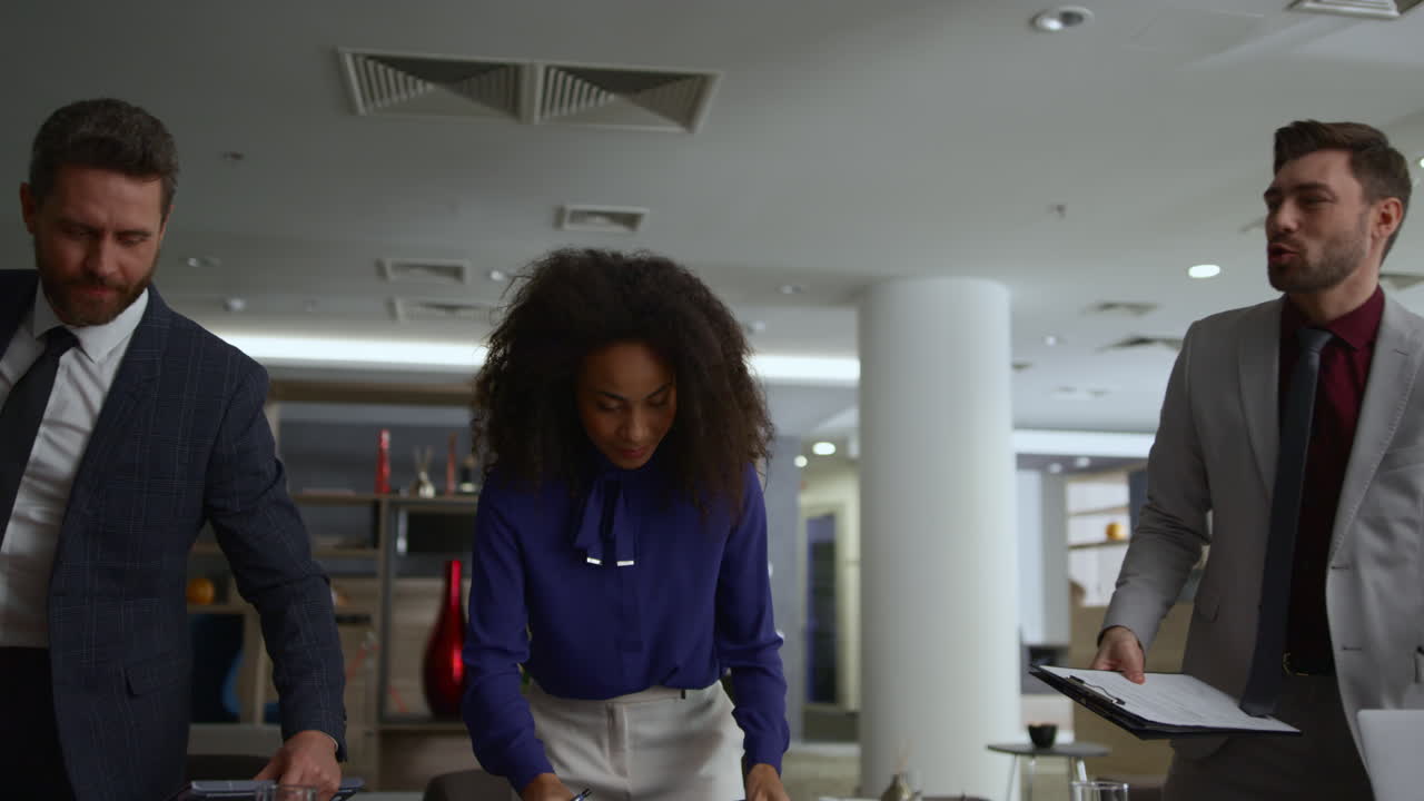 Diverse entrepreneurs team ending work