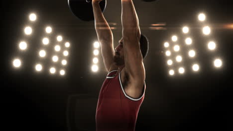 young man lifting up barbell