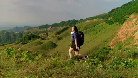 north vietnam scenic trekking path landscape solo female asiatic woman backpacking alone in slow motion