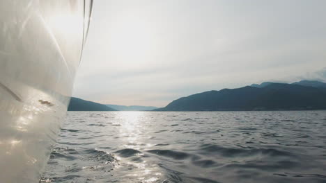 boat on the sea with mountains view