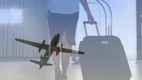 Animation-of-airplane-over-caucasian-female-flight-attendant-with-suitcase