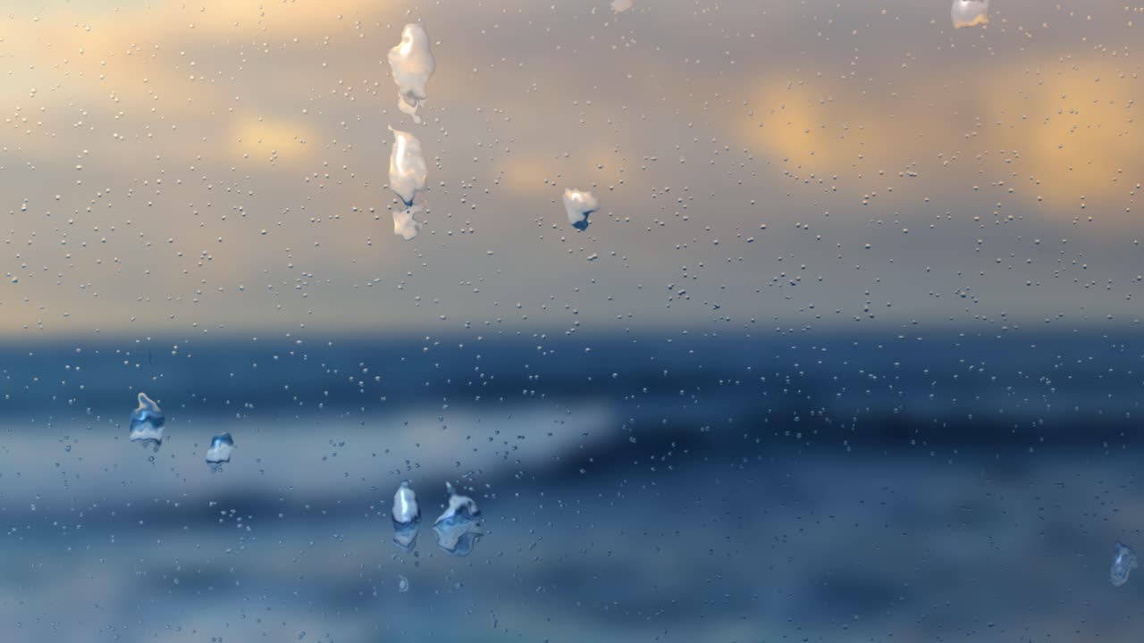 흐림 해변 보기 배경으로 창문에 빗방울