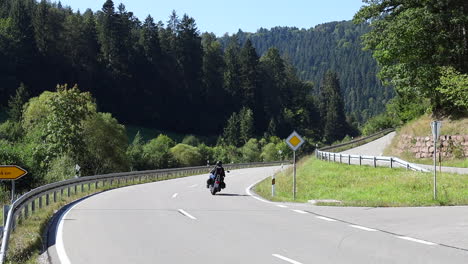 motorcycle cruising in the mountains on a beautiful summer day