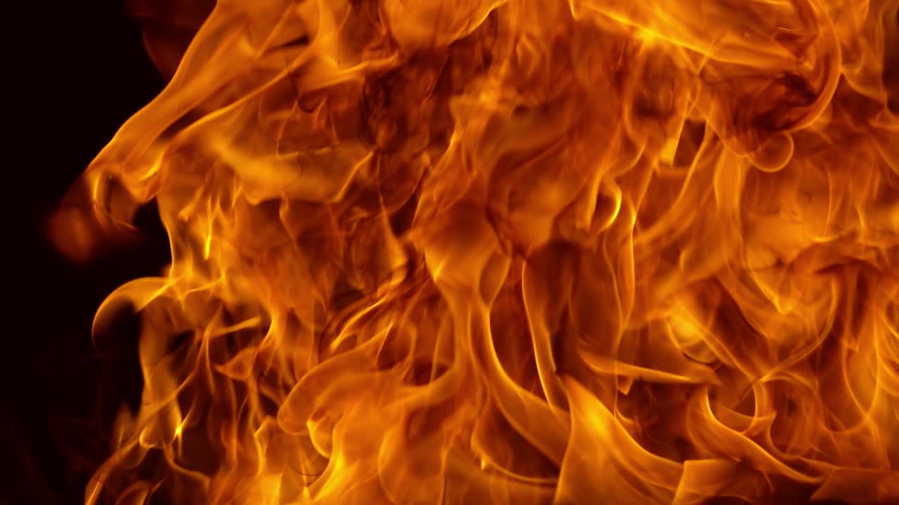 Flames of fire on black background in slow motion