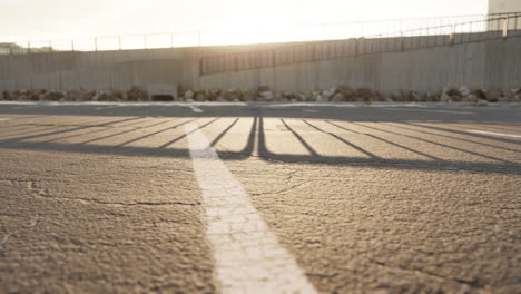 sunset shadows in an empty parking lot