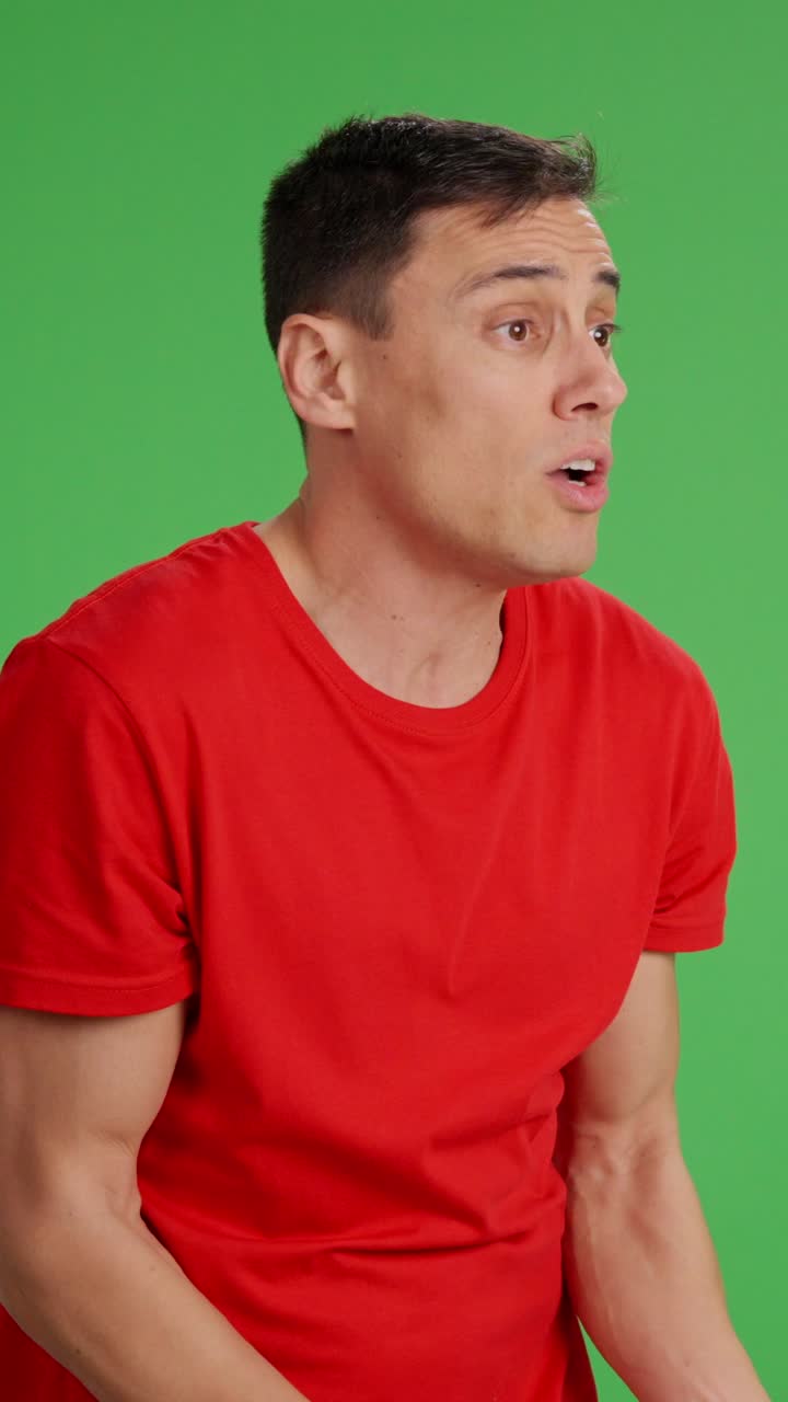Impatient man on green screen urging someone to hurry