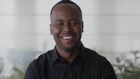 portrait-confident-young-african-american-entrepreneur-laughing-enjoying-professional-lifestyle-success-black-businessman-in-office-slow-motion-career-ambition