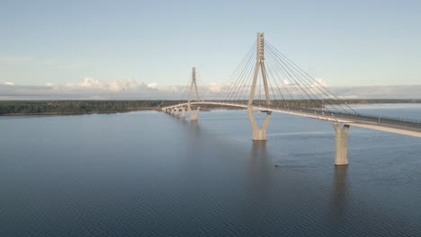 dramatic view of bus traveling through replot bridge over vast ocean