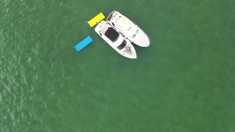 People-on-Tropical-Caribbean-Vacation-Enjoying-Time-on-Boats---Aerial