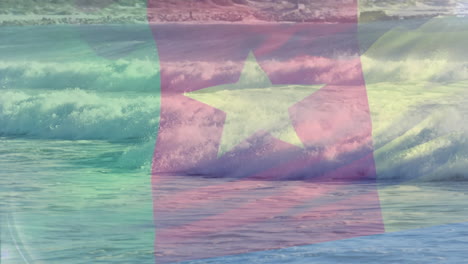 digital composition of cameroon flag waving against aerial view of waves in the sea