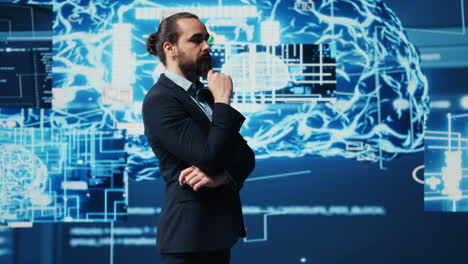 young businessman reviews artificial intelligence neural networks on dashboard