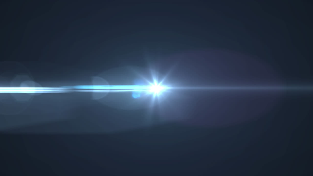 Animation of white light with beam and lens flare on black background